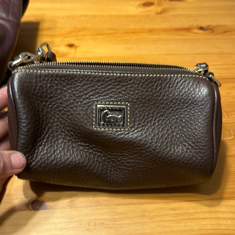 Brown Dooney and bourke wristlet excellent condition